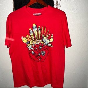 New tee with a very unique handdrown design.